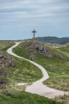 Path to a cross on a hillside